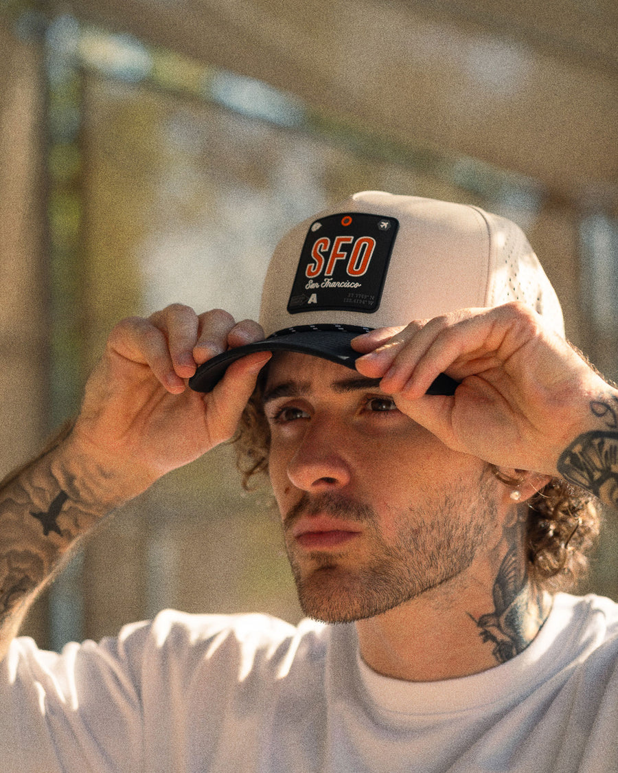 Close-up of a WRLD TAGS performance cap